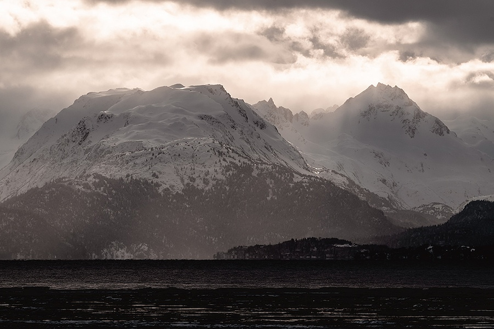 Misty Peaks and Sunbursts